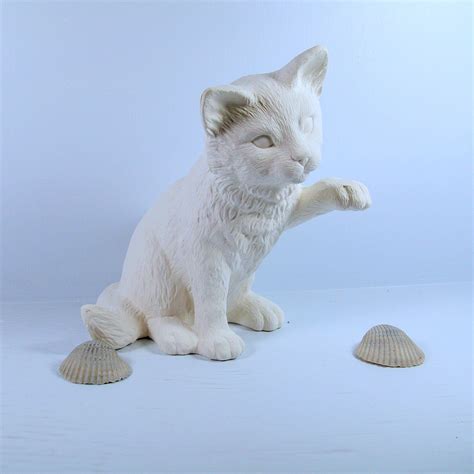 It is a ready to paint - u paint piece of ceramic bisque. . Unpainted ceramic figurines